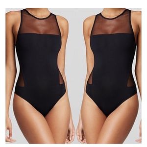 Black one piece with mesh accents Sz s